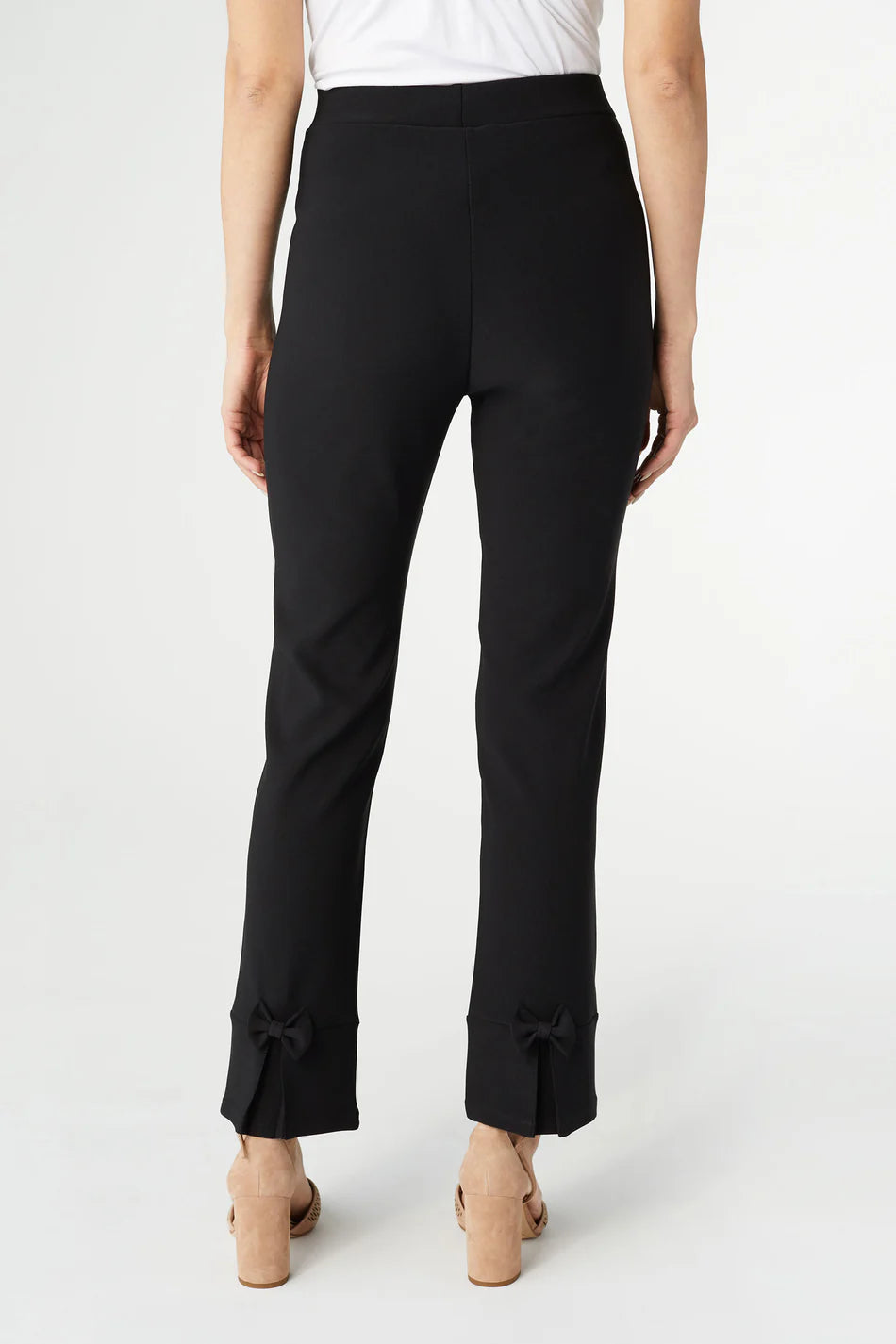 Coco and Carmen Black pants with bow accent on ankle