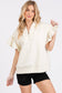 SCUBA HALF ZIP UP RUFFLE SLEEVE TOP: CREAM