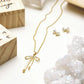 Treasure Box Bow Necklace - I Said a Little Prayer for You: Pine Wood, Zinc Alloy, Glass / Necklace: 17 L with 2 Extender, Box: 2 W x 1.25 H x3 D