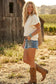 SCUBA HALF ZIP UP RUFFLE SLEEVE TOP: CREAM