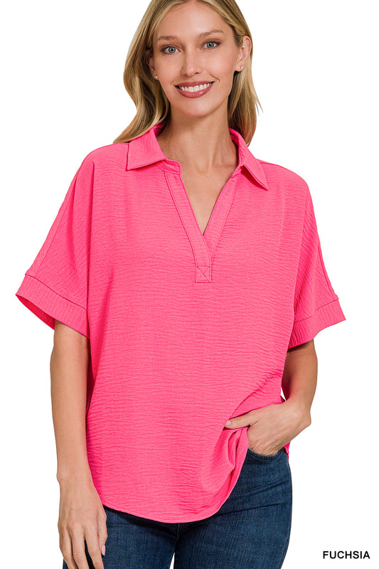 Zenana Woven airflow collared v-neck short sleeve top Fuchsia